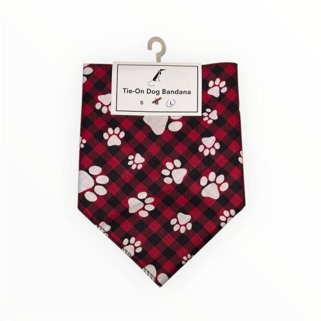Red plaid dog bandana with paw prints on a white background