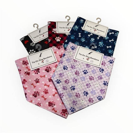Set of tie-on dog bandanas with various patterns on a white background
