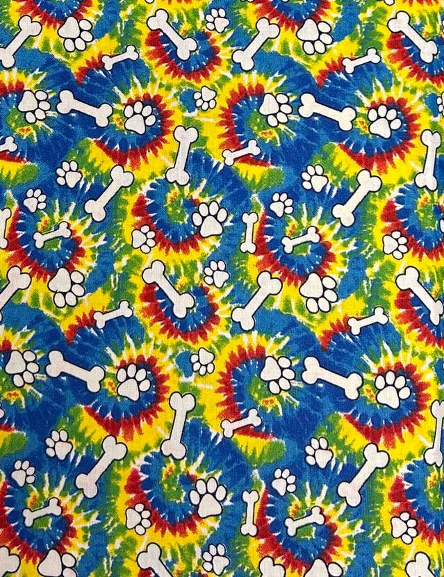 Tie-dye pattern with bones and paw prints on a colorful background