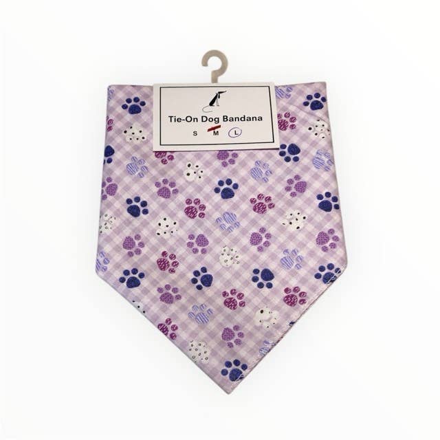 Dog bandana with paw print pattern on a checkered background, displayed on a hanger.