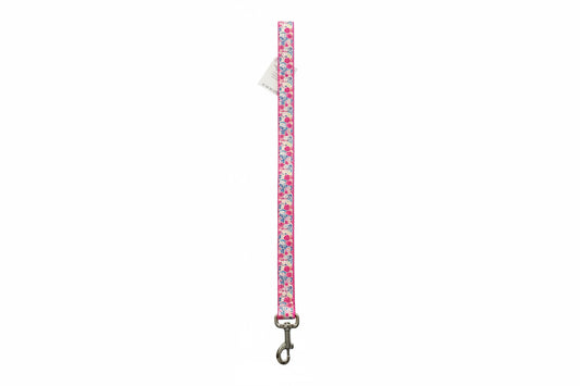 Floral patterned dog leash on a white background