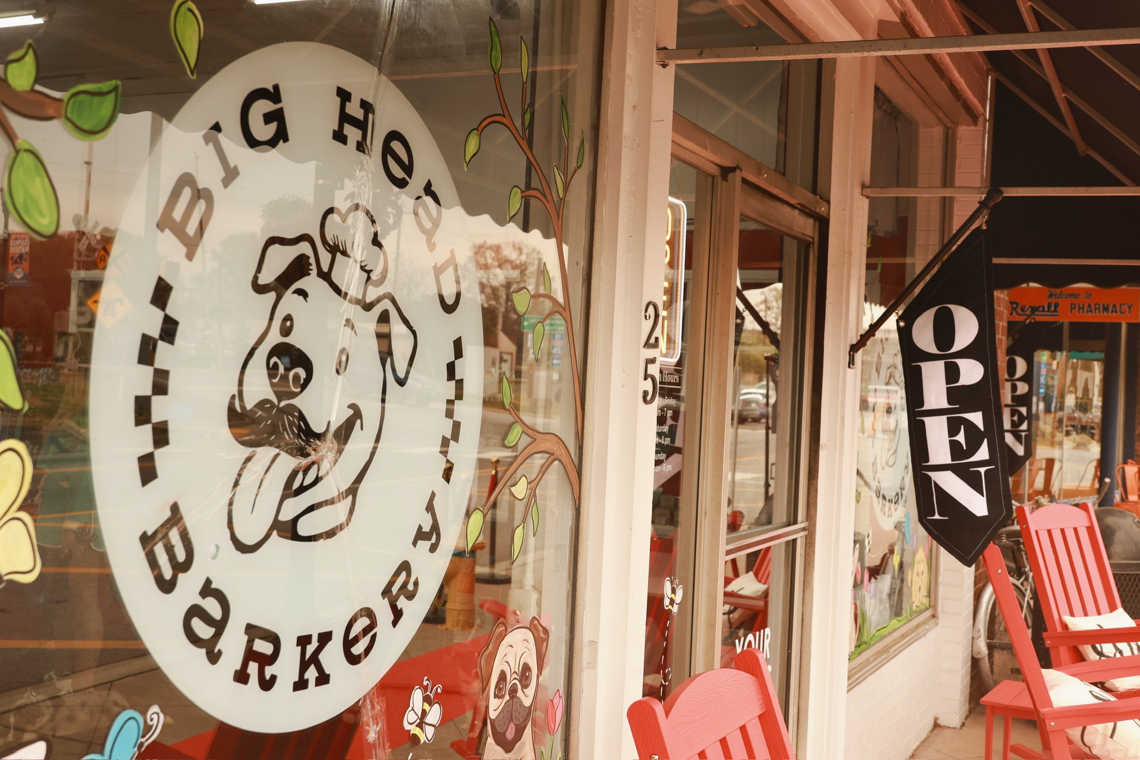 Storefront with 'Big Hound Barkery' sign and 'Open' sign outside