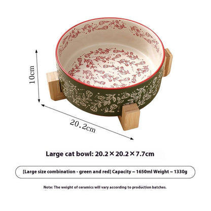 Large ceramic cat bowl with floral design and wooden handles, shown with measurements on a white background.