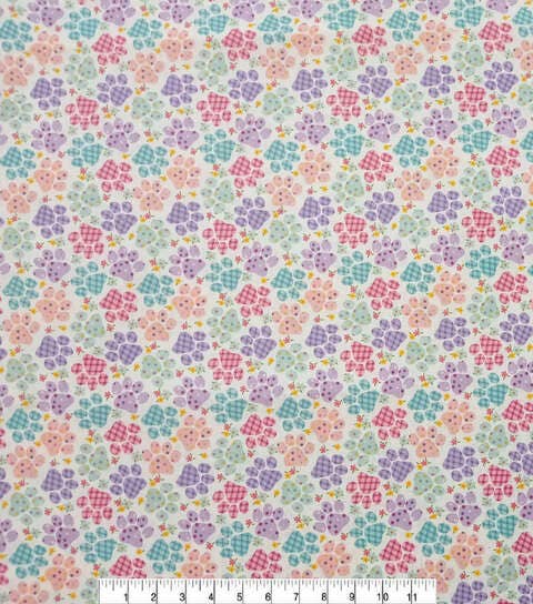 Floral pattern fabric with a ruler at the bottom for scale