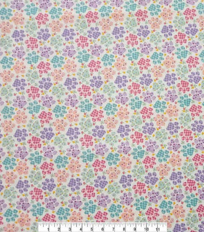 Floral pattern fabric with a ruler at the bottom for scale