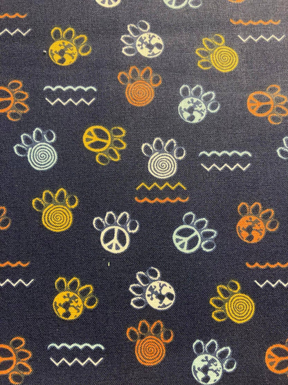 Patterned fabric with various symbols on a dark background