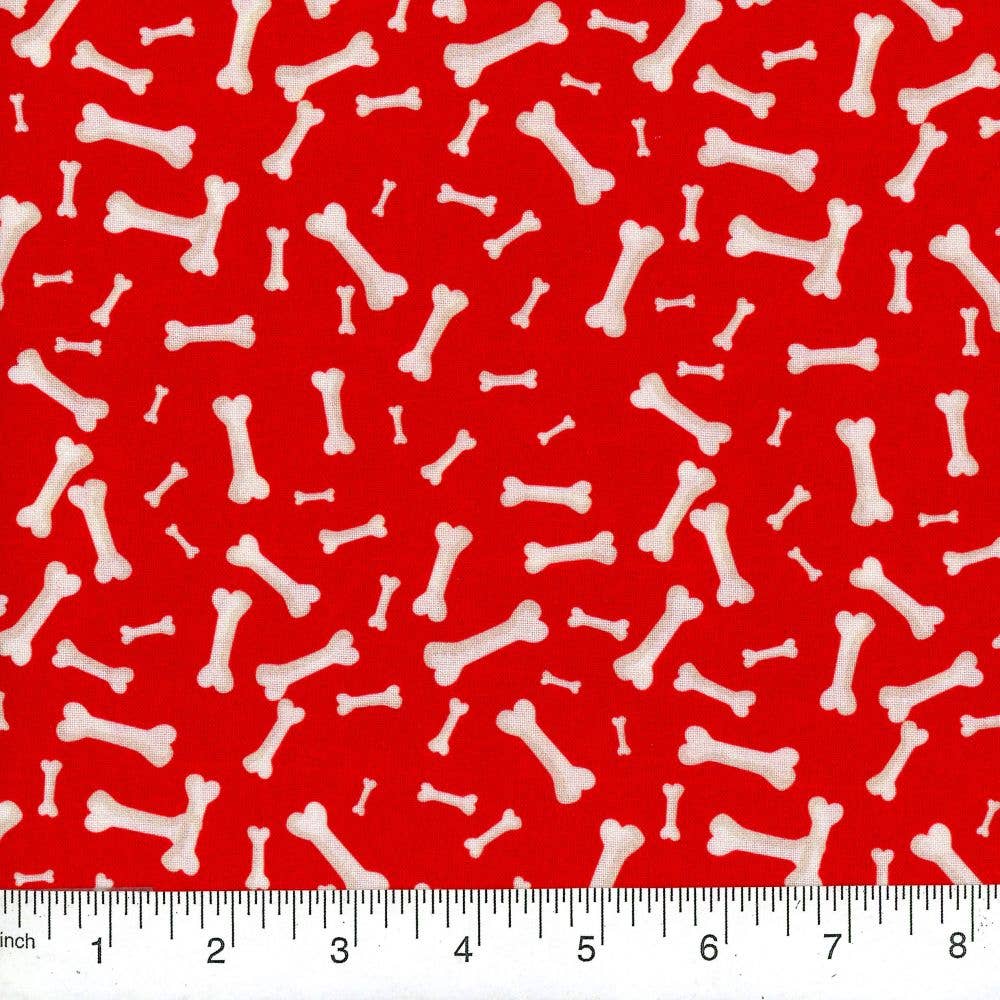 White bone pattern on a red background with a ruler at the bottom.