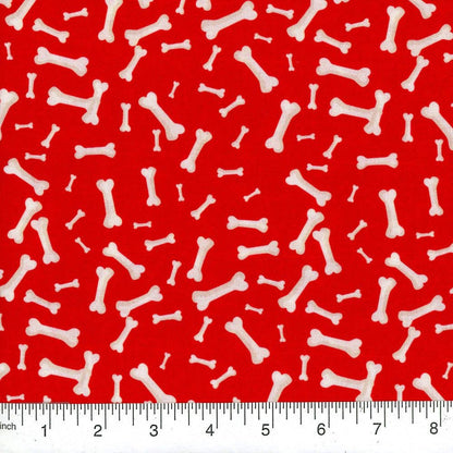 White bone pattern on a red background with a ruler at the bottom.